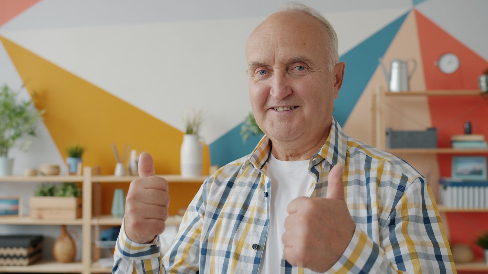 Confident senior man smiling after full-mouth dental implant treatment at Palm Beach Institute of Dentistry